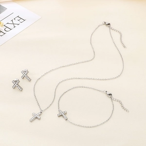 Silver stainless steel jewelry set featuring sparkling cross pendants for women