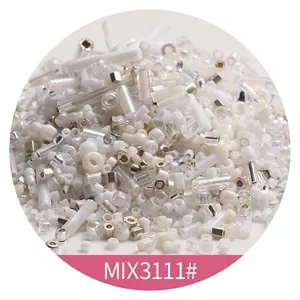 Assorted Miyuki glass beads in white and silver finishes for DIY jewelry making