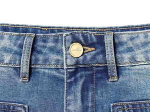 Detailed close-up of high waist jeans featuring a gold metal button and yellow stitching