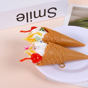 Realistic sundae ice cream cone keychain with colorful beads and red cherry detail
