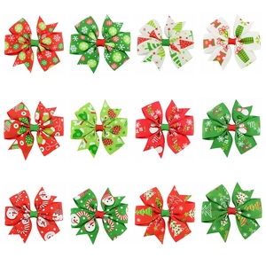 Set of 12 Christmas hair bows for girls featuring festive snowmen and bells patterns