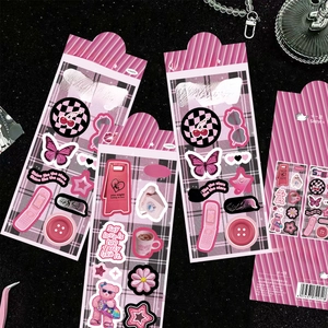 Detail of pink retro aesthetic PET stickers with cherry and butterfly designs for DIY journaling