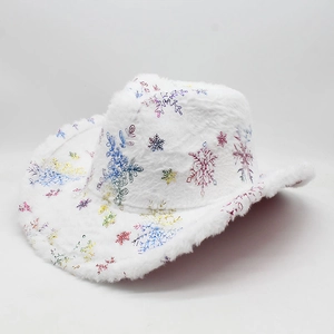 Detail of white plush cowboy hat with holographic laser snowflake patterns for Christmas