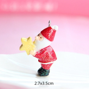 Sparkly resin Santa Claus pendant with yellow star and golden loop, size 2.7x3.5cm
