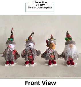 Close-up of four Christmas plush ornaments featuring reindeer and gnome figures with sequins