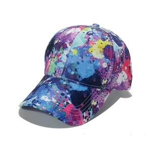 Women's baseball cap featuring vibrant multi-color graffiti paint splatters on canvas