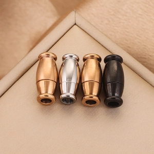 Macro view of four magnetic jewelry clasps in rose gold, silver, bronze and black matte