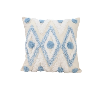 Modern square tufted pillow cover with blue and white geometric embroidery and tassels
