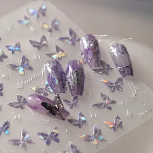 Macro detail of holographic purple butterfly nail stickers with aurora laser effect
