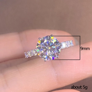 Classic platinum plated 9mm round cubic zirconia 6-prong engagement ring weighing about 5g