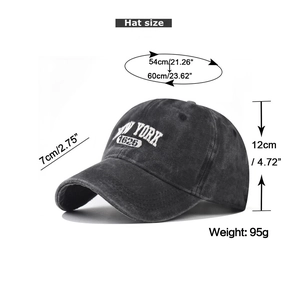 Detailed view of New York embroidery on washed cotton baseball cap with dimensions