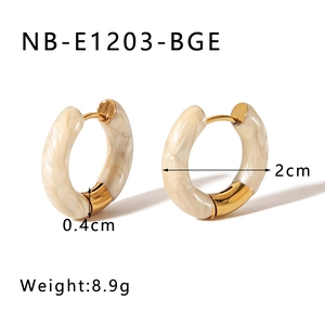 Detail view of 18K gold plated hoops with beige resin and precise size measurements