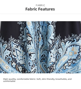 Dettaglio del tessuto in velluto blu scuro con motivo paisley e ricami raffinati