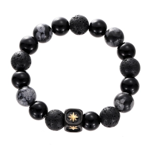 Men's black agate and obsidian bead bracelet with a golden star charm on white background