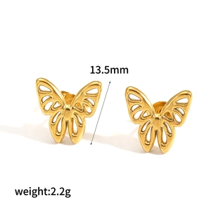 Detailed view of 18k gold butterfly stud earrings with hollowed-out wing craft