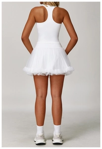 White racerback sports dress with multi-layered pleated tulle skirt for tennis and fitness