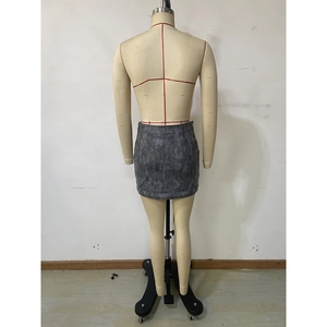 Detail of grey bodycon mini skirt with suedette texture and high-waist design