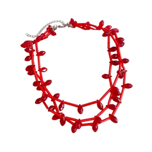 Red multilayer beaded necklace with glass tube and teardrop charms on a white background