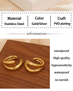 Macro detail of wave-shaped hollow stainless steel ring with PVD gold plating finish