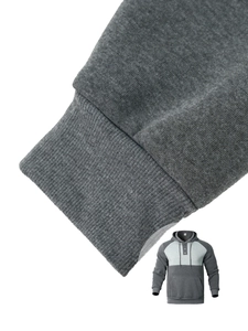 Detail view of the ribbed knit cuffs on a men's color-block gray drawstring hoodie