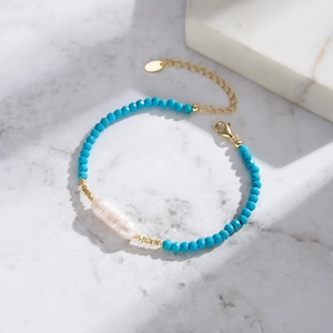 S925 silver beaded bracelet with turquoise beads and a baroque pearl in 14K gold finish