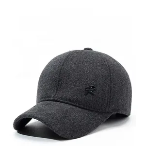 Detail of dark grey wool baseball cap with metallic R logo and ear protection design