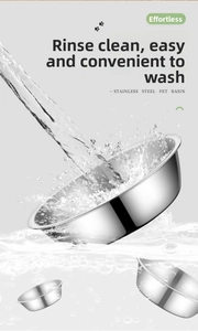 Water rinsing a polished stainless steel pet bowl to show its easy-to-clean surface