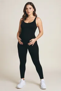 Front view of seamless black maternity bodysuit featuring elastic compression fabric