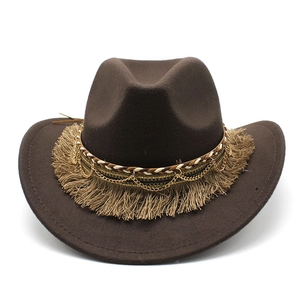 Detail of dark brown felt cowboy hat with braided band, fringe, and gold chain accents