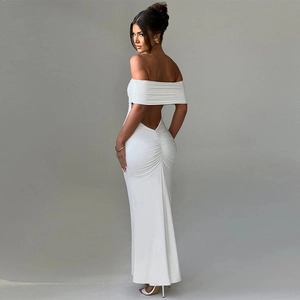 Rear view of white off-the-shoulder backless dress showing ruching detail on hips