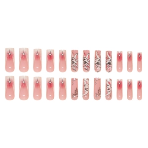 Press-on nails with sun and moon designs in pink gradient and long trapezoid shape