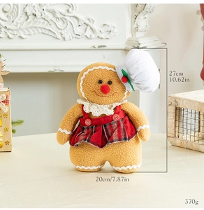 Detail of gingerbread plush doll in red plaid dress and chef hat with size dimensions