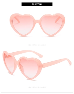 Close-up of upgraded pink heart-shaped polarized sunglasses in front and side views