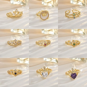 Luxurious gold rings set with colorful gemstones and elegant heart crown designs