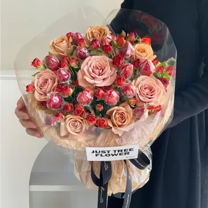 Christmas strawberry bouquet base with champagne roses and decorative candies