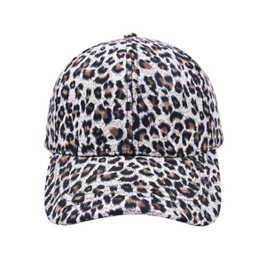 Close-up of leopard print pattern and twill cotton fabric on women's baseball cap