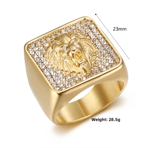 Macro shot of 23mm square gold lion head ring with crystal pavé and brushed finish