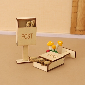 Miniature wooden Christmas dollhouse mailbox with post sign and tiny newspapers