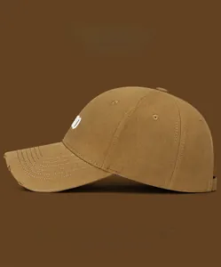Detailed side view of khaki distressed baseball cap with premium 3D embroidery and stitching