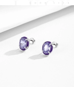 Detail of S925 sterling silver stamp on elegant oval lavender purple gemstone earrings