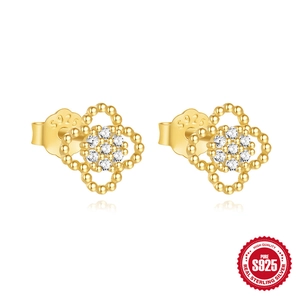 S925 sterling silver gold clover stud earrings with white zircons on white background