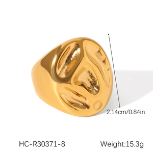 Detailed view of heavy gold-plated irregular ring with size 2.14cm and 15.3g weight