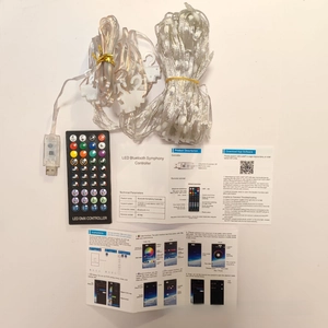 Detail view of RGB LED curtain light set with 40-key remote control and USB interface
