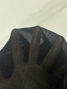 Top aderente in mesh nero a maniche lunghe con dettagli glitter e tessuto velato