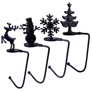 Set of 4 black metal Christmas stocking holders with reindeer snowman snowflake designs