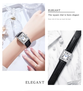 Detail of elegant rectangular watch with Roman numerals and blue crown jewel