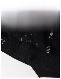 Macro detail of breathable mesh fabric and wide sweatband inside the black baseball cap