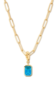 Detail view of 18K gold plated paperclip chain with rectangular blue gemstone pendant