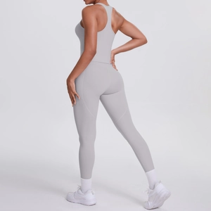 Detail showing back view of light grey racerback sports top and high waist yoga pants set