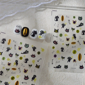 DIY black cat nail art stickers with fishbone and star designs for creative manicures
